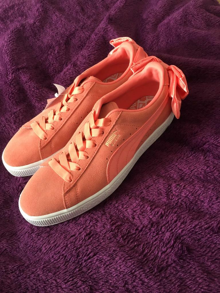 pink puma trainers with bow